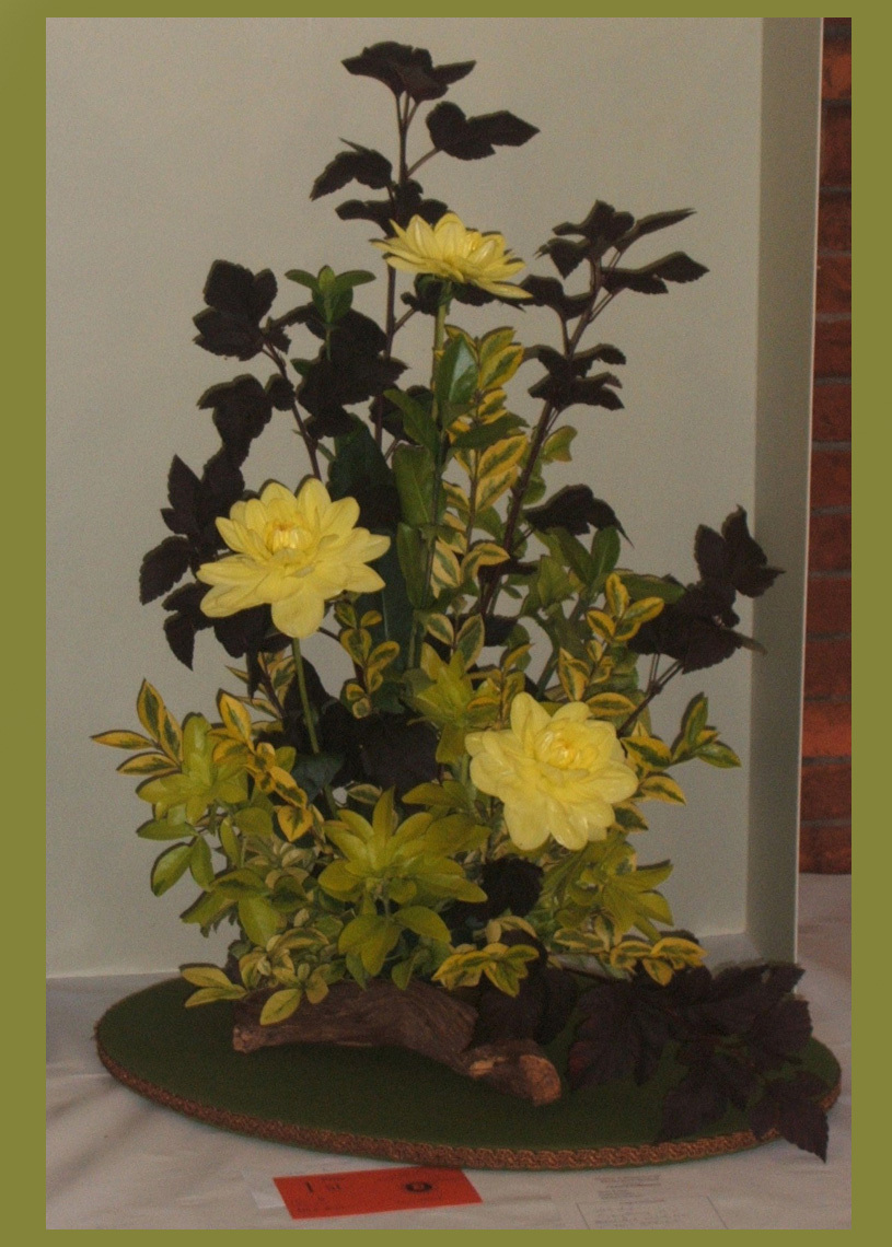 Autumn 200x Arrrangement using 3 flowers and Foliage